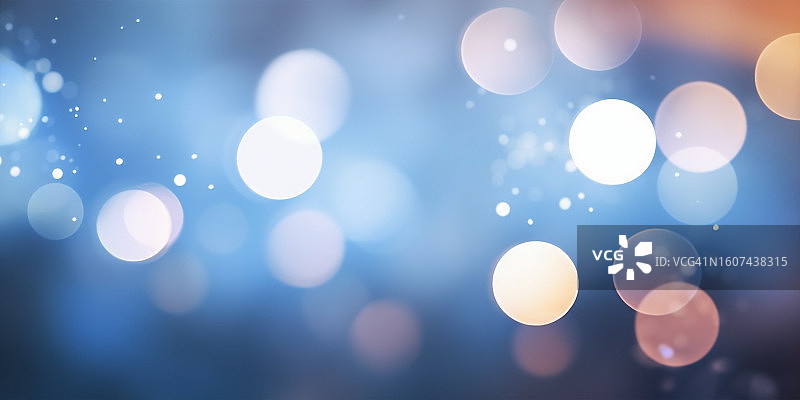 蓝色背景上的虚化光点图片素材