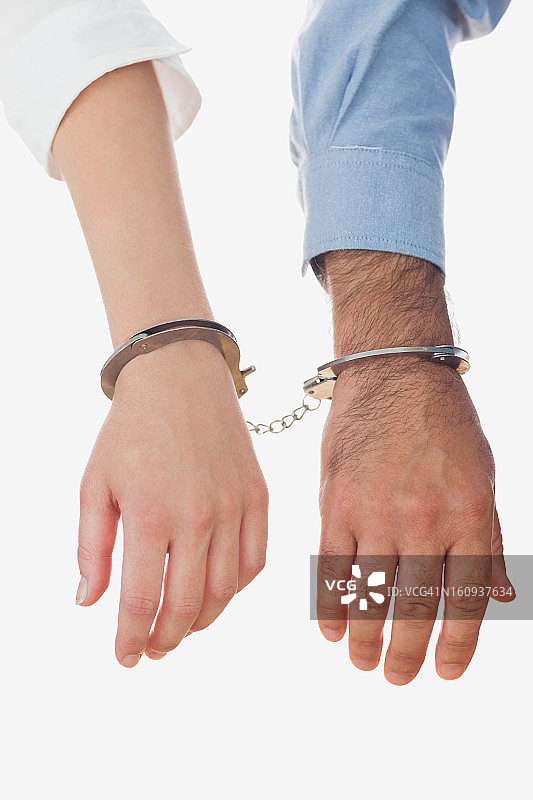 戴手铐的商务人士特写图片素材