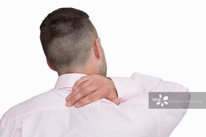 脖子疼痛的商务男士背影图片素材