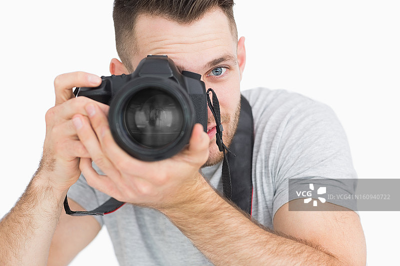 男性摄影师与照相机特写图片素材