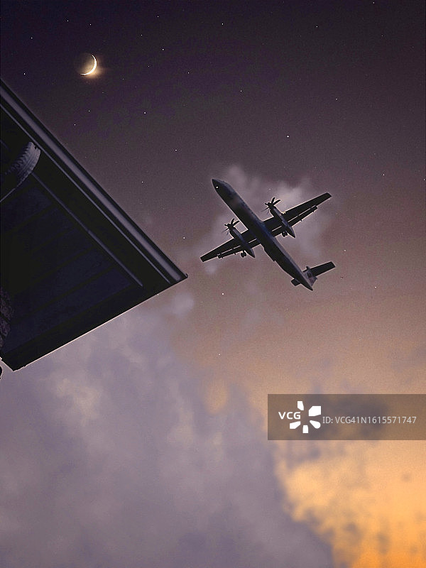 住宅区上空的飞机图片素材