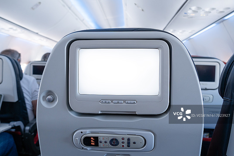 飞机上的乘客座椅屏幕图片素材