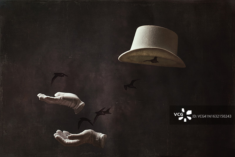 戴着高礼帽和手套的隐形人表演魔术图片素材