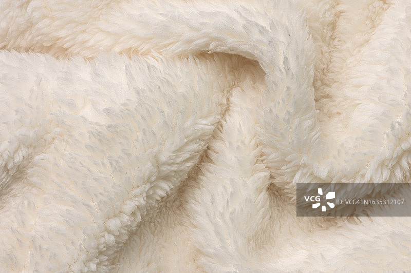 柔和优雅：白色蓬松面料特写图片素材