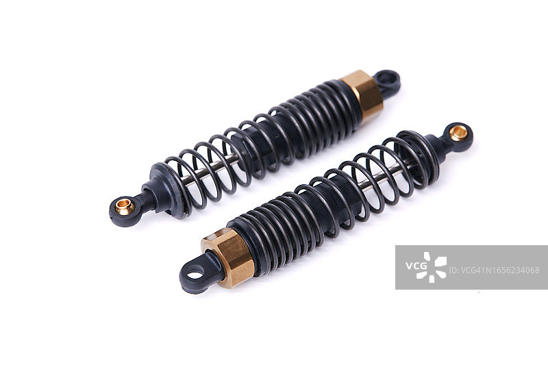 白色背景上的一对汽车减震器图片素材