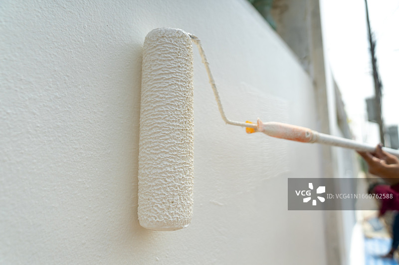 房屋油漆和油漆刷图片素材