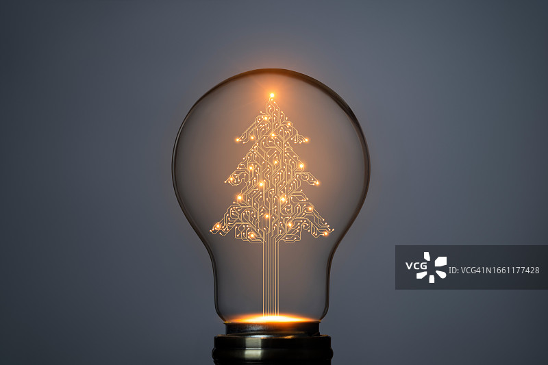 灯泡里的人工智能电路板圣诞树标志图片素材