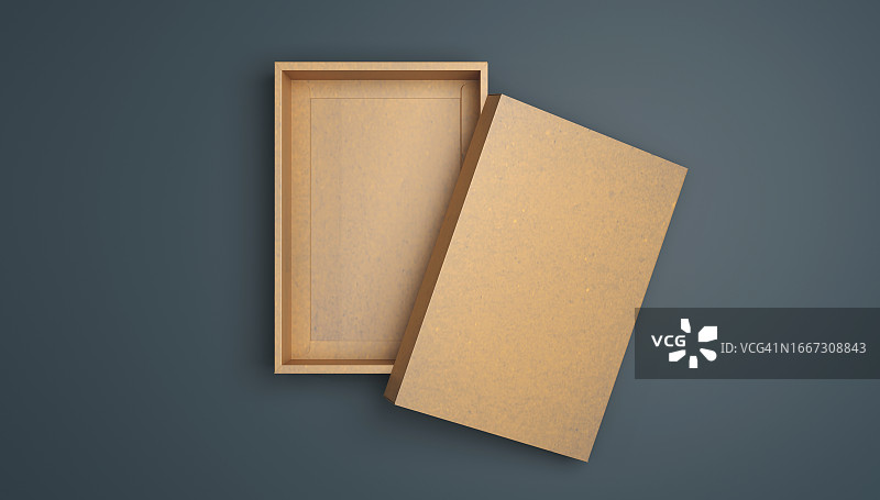 蓝色背景上的空纸板箱图片素材