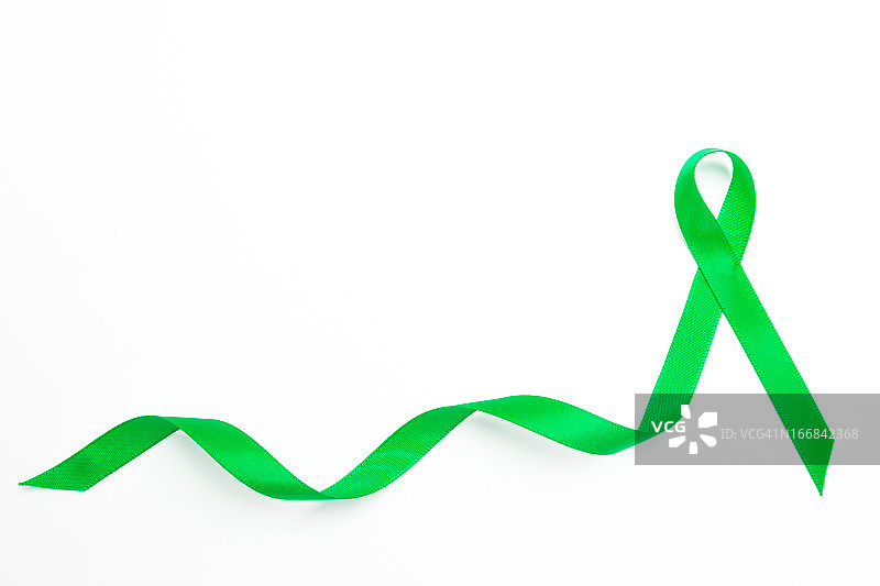 带有轨迹的绿色公益丝带图片素材