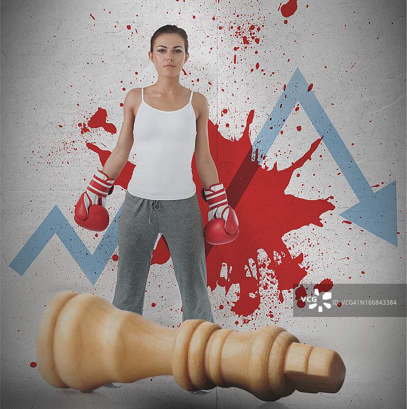 女拳击手与失败的箭头、血迹以及倒下的棋子图片素材