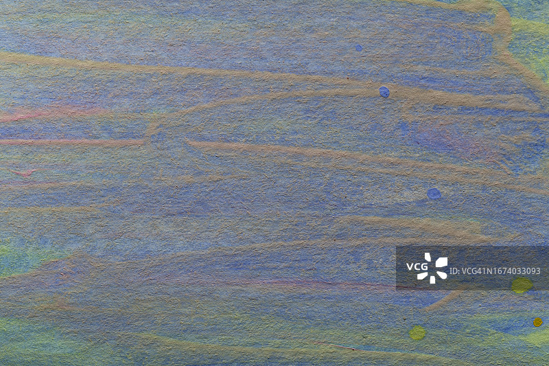 一个抽象的彩色水彩渐变填充背景与水彩污渍的特写。图片素材