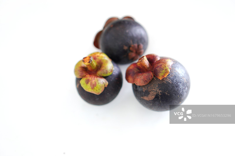 白色背景下的山竹果图片素材