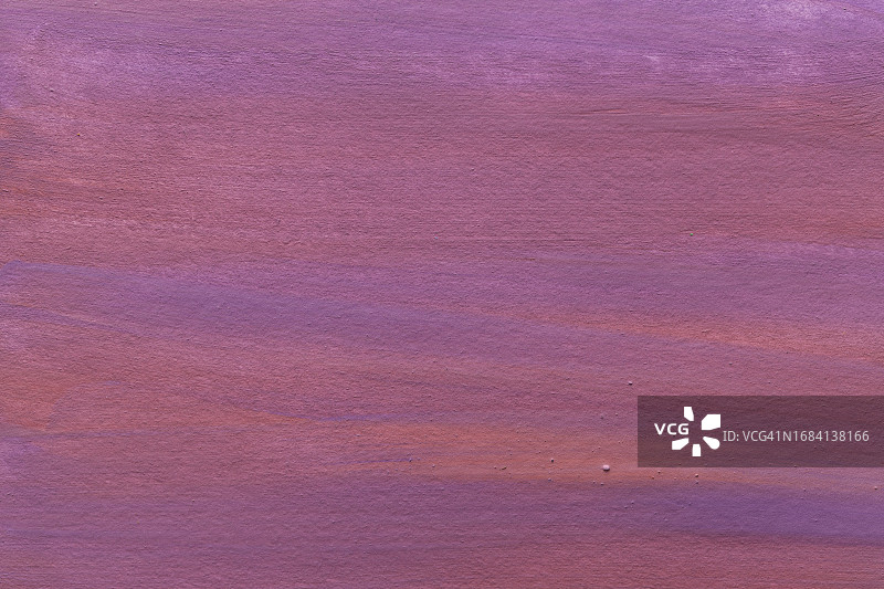 一个抽象的彩色水彩渐变填充背景与水彩污渍的特写。图片素材