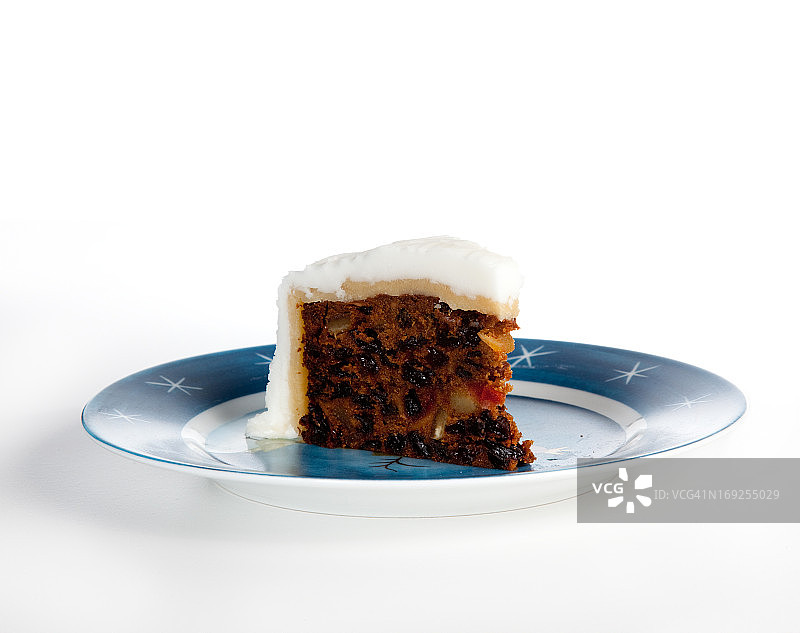 蓝色星盘上的三角形传统圣诞蛋糕图片素材