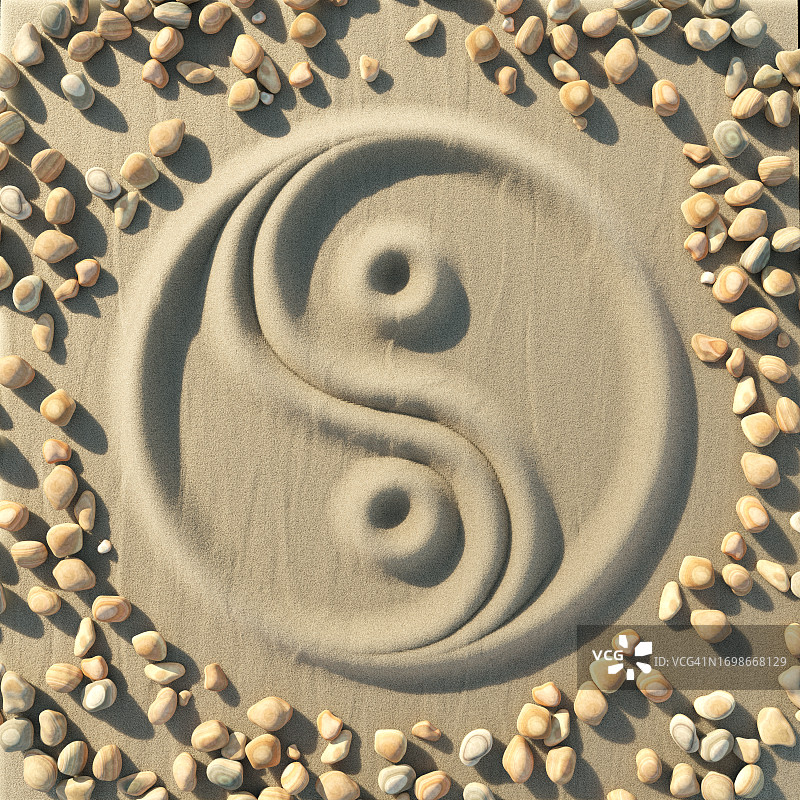 沙滩上的阴阳符号与岩石图片素材