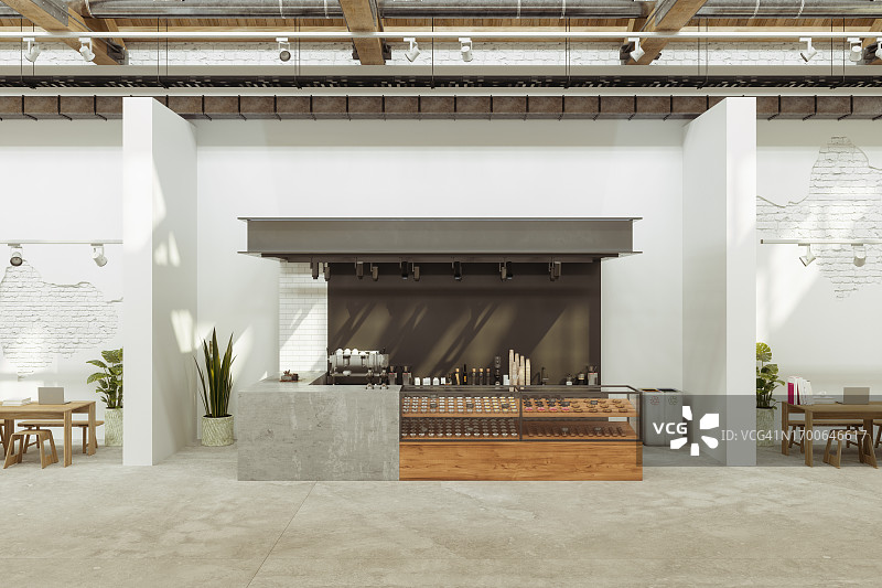 带木桌、凳子、笔记本电脑、咖啡机和蛋糕展示冰箱的空咖啡店内部图片素材