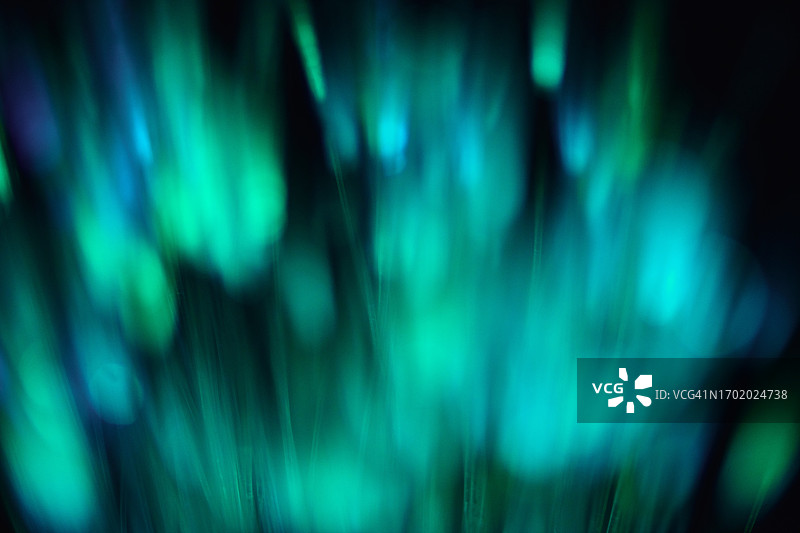 具有散景散焦光和阴影的抽象绿色背景图片素材