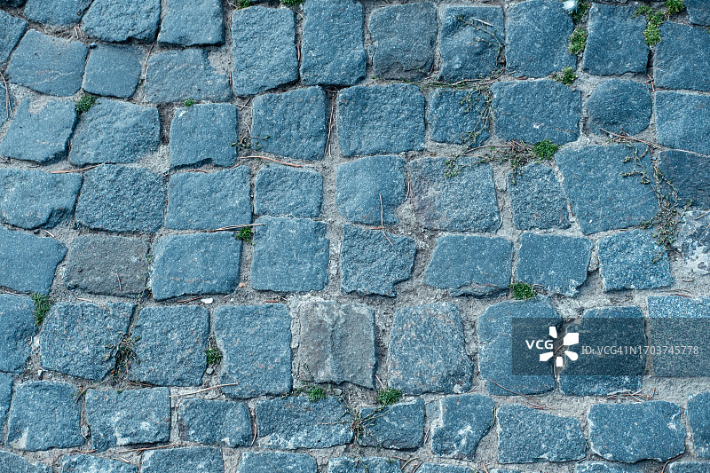 灰色湿滑粗糙的铺路石俯视图图片素材