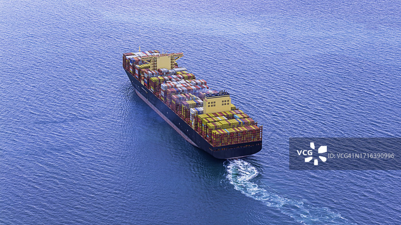 蓝色大海中航行中的单艘货船航拍图片素材