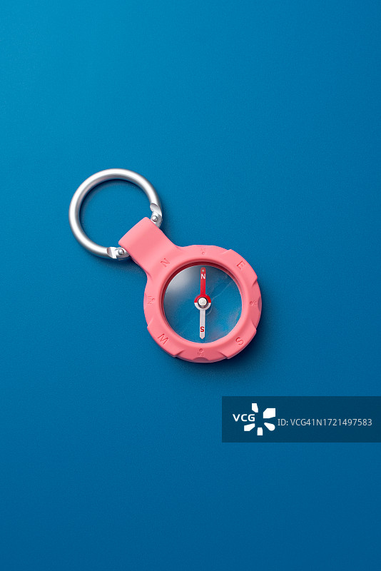 蓝色背景上的航海罗盘图片素材