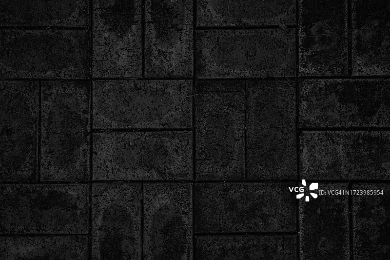 黑色砖墙。裸露砖砌地下室墙壁背景图片素材