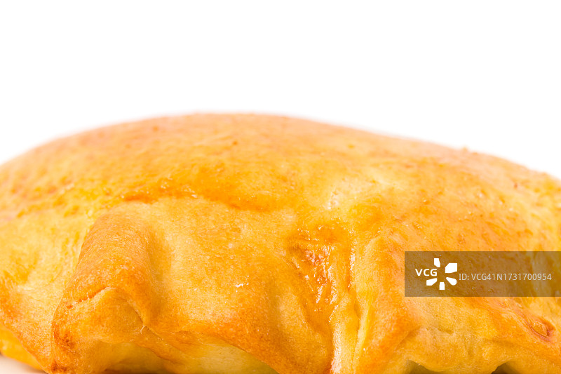 白色背景下的面包特写图片素材