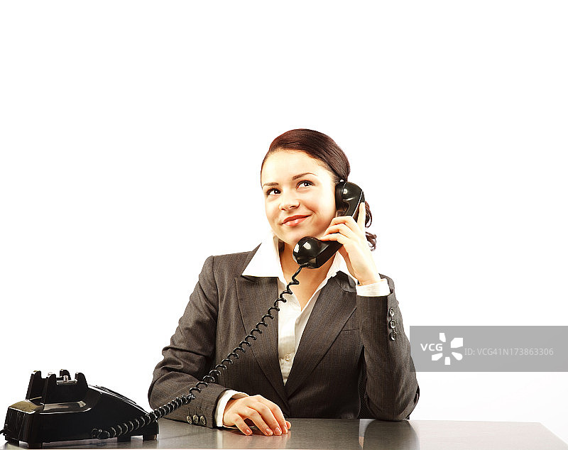 迷人的女商人正在打电话图片素材