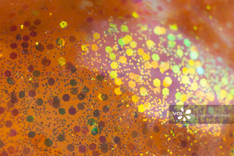 虹彩橙色抽象闪光背景（可用于文字叠加）图片素材