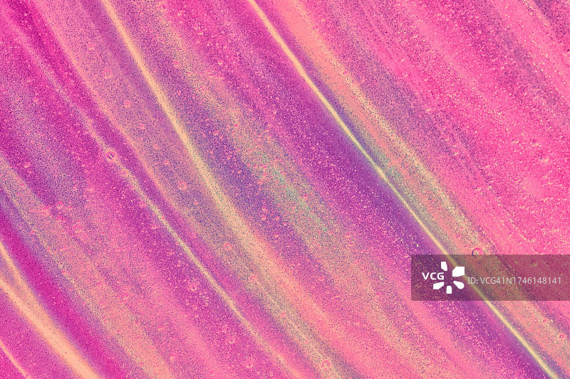 美丽的粉色、橙色和紫色透明波浪图案闪光泥凝胶背景纹理图片素材
