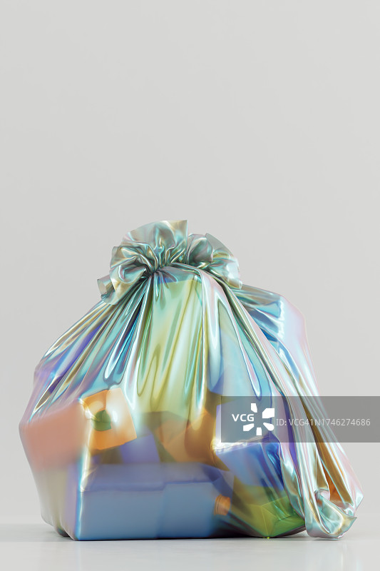 为了更清洁的地球拥有更绿色的明天。装有纸板箱的两个可回收塑料袋。世界环境日概念。图片素材