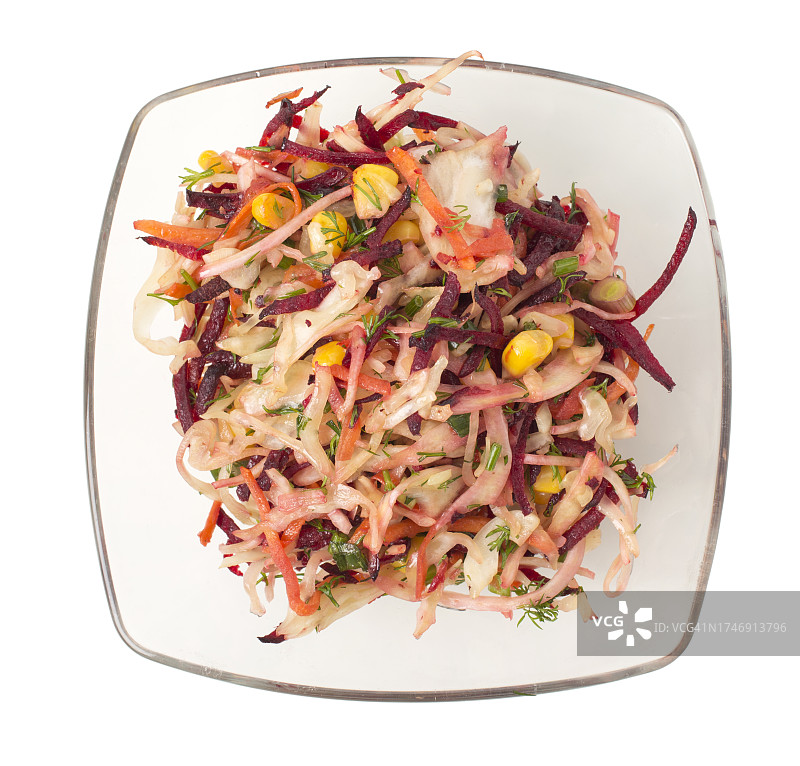 白色背景上盘中沙拉的俯视图图片素材