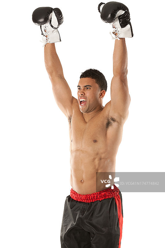 拳击手举起双臂大喊图片素材