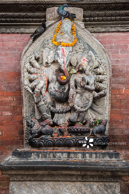 象头神与成就天女雕像图片素材