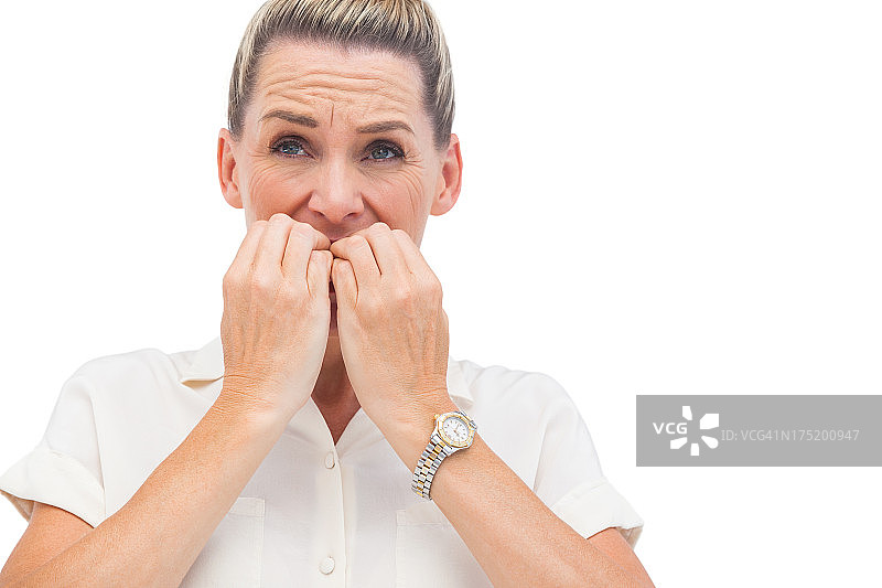 焦虑的商人咬指甲图片素材