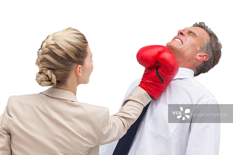 被击中上勾拳的商人图片素材