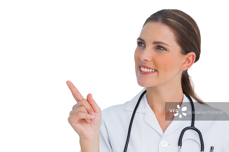 快乐的护士向上指图片素材