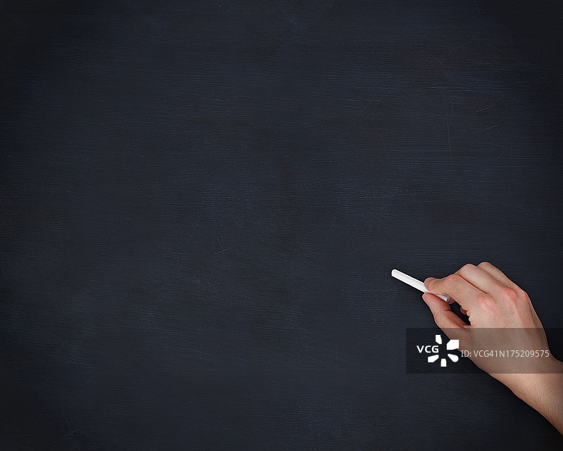 手在黑板上图片素材