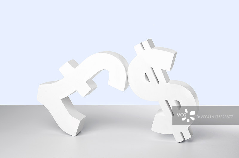 白色背景上的美元和英镑符号图片素材