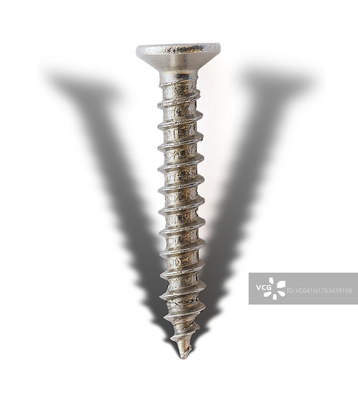 带有细长阴影的银色金属螺丝图片素材