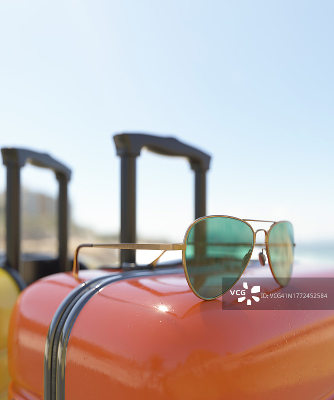 海滩上充满活力的行李箱和太阳镜的假日旅行3D渲染图片素材