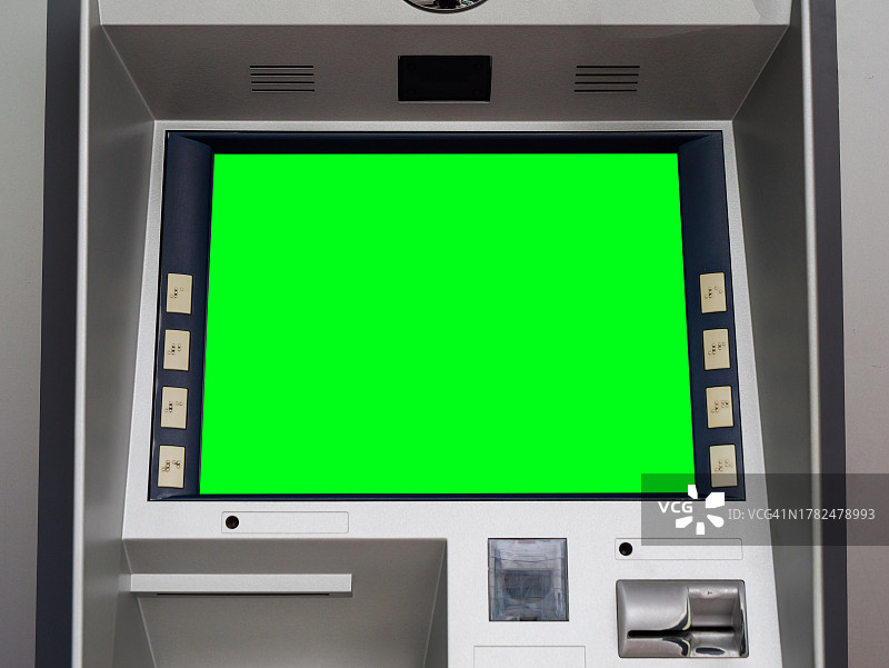 泰国芭堤雅商业街银行自动取款机上的绿屏显示图片素材