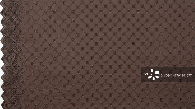 棕色蕾丝棉布抽象背景特写图片素材