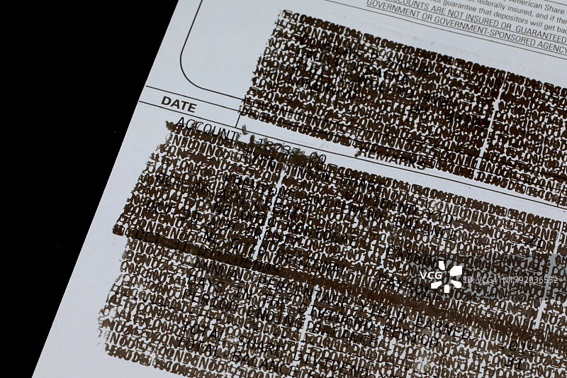 防止身份盗窃印章滚轮在账单背面图片素材