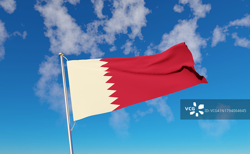 卡塔尔国旗与蓝色天空背景图片素材