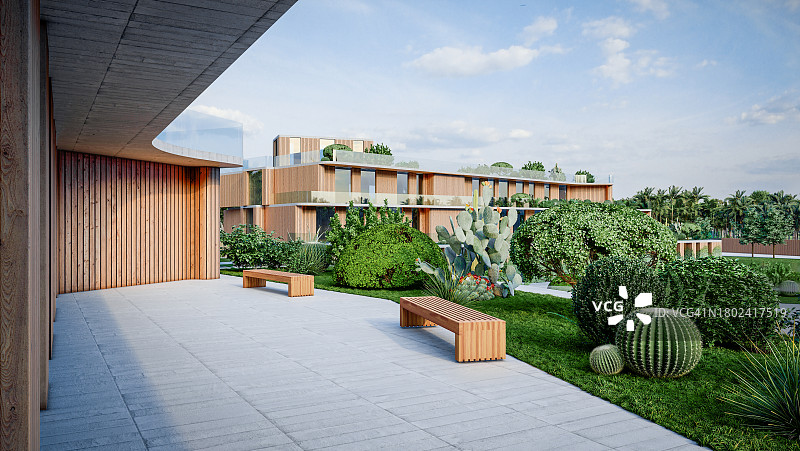 带有草和植被的新学校建筑的美丽绿色露台，木制外墙和大窗户图片素材