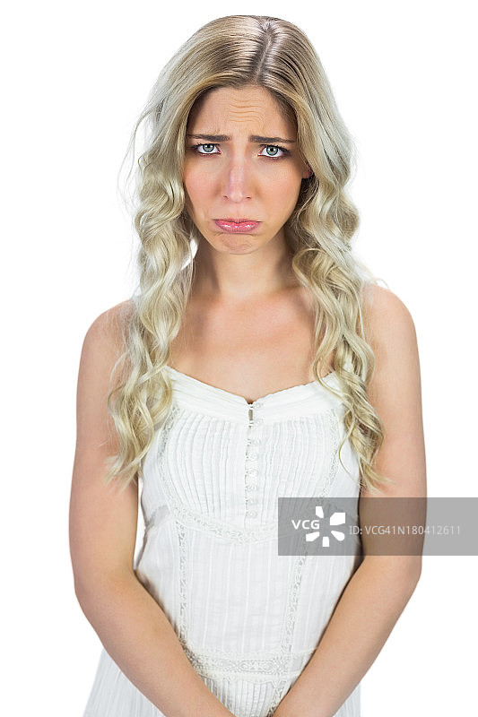 沮丧的金发卷发女子图片素材