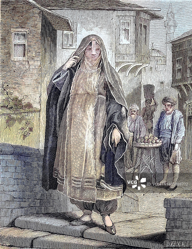 一位戴着面纱外出的埃及妇女，1881年木刻版画（数字修复）图片素材