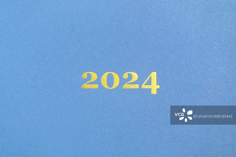 蓝色背景上的2024新年祝福图片素材