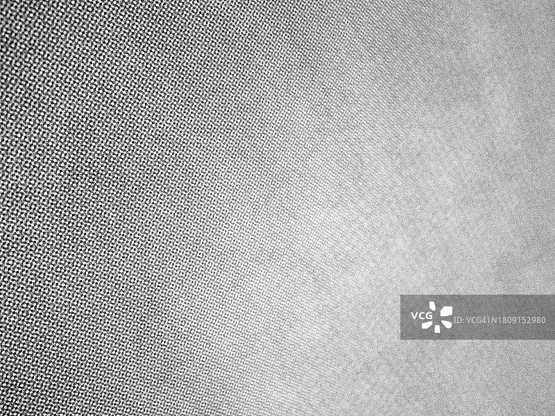 黑白特写：巴黎白纸上的模糊圆点图片素材