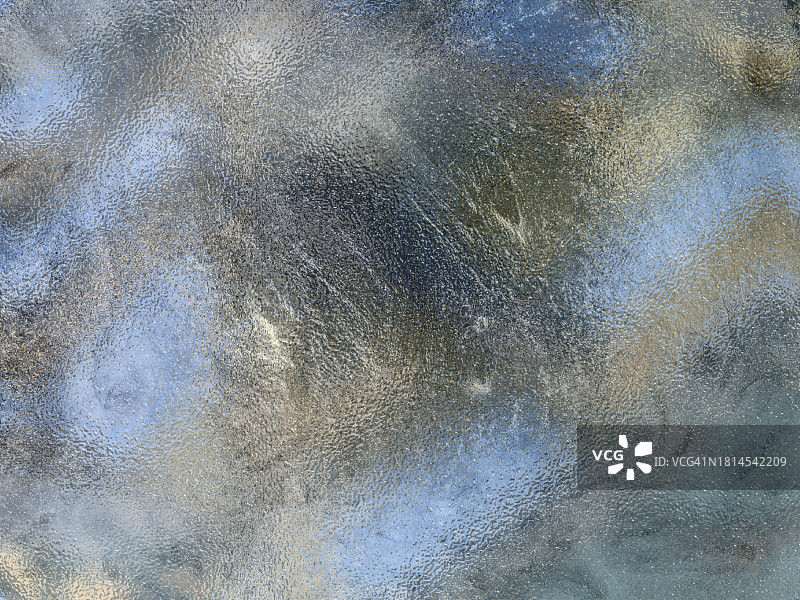 抽象背景：粗糙的柔和蓝色半透明磨砂玻璃图片素材